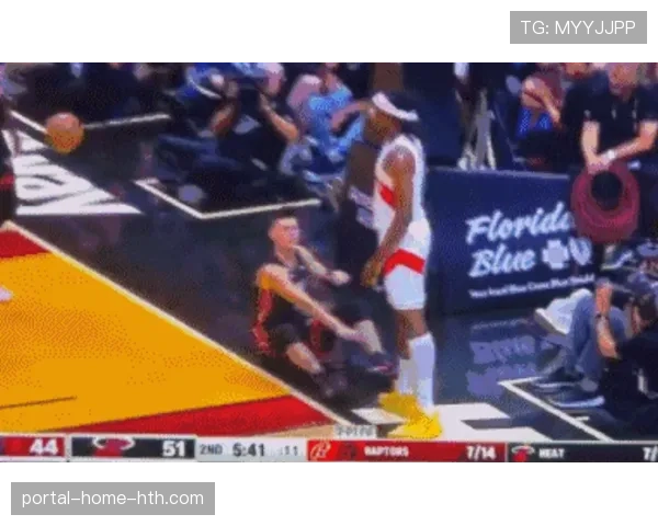 “冲突瞬间:猛龙与热火比赛中爆发大规模技术犯规”